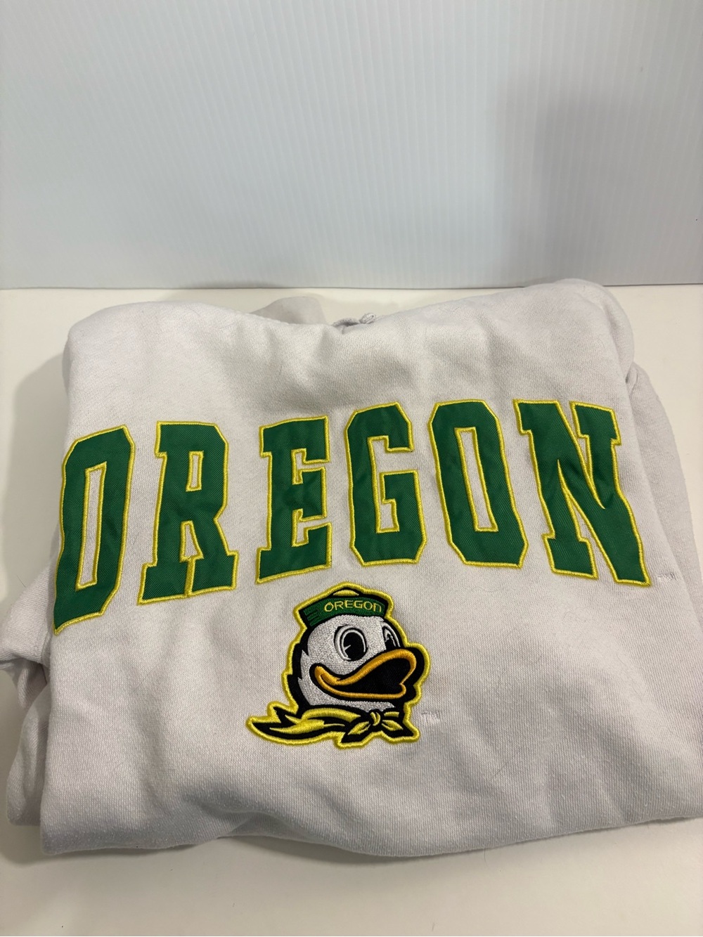 Oregon Ducks Colosseum White Pullover Hoodie with Green & Yellow Lettering